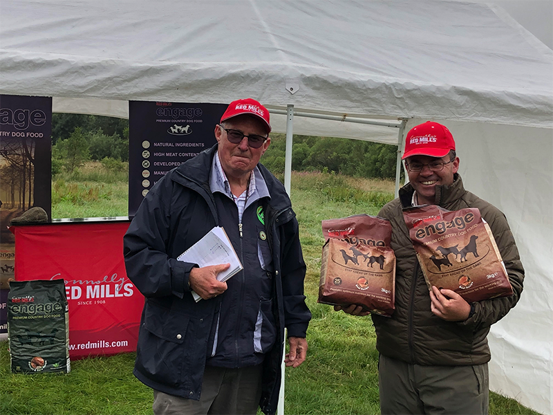2021 Puppy Stake winner Colin Forde and Secretary Jon Kean. The trials were held at Burncastle Estate, by gracious permission of the Duke of Northumberland. The trials received generous sponsorship from Red Mills.